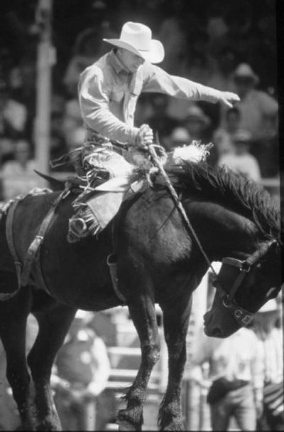 
The annual Calgary Stampede rodeo, scheduled  for July 6-15, inspires  a Mardi Gras-style celebration  with cowboy hats instead of beads.
 (Dennis Thomas / The Spokesman-Review)