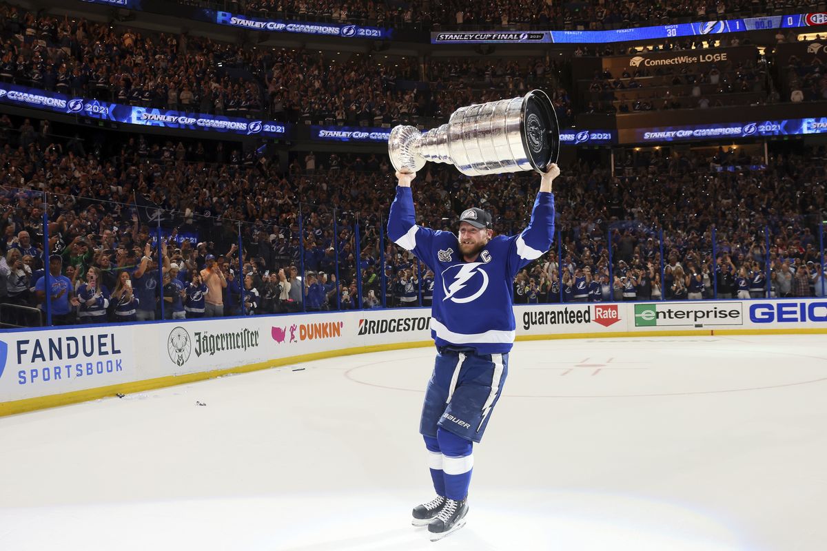 The Tampa Bay Lightning’s Steven Stamkos hoists the Stanley Cup after the team’s 1-0 victory against the Montreal Canadiens in Game 5 of the Stanley Cup finals Wednesday in Tampa, Fla.  (Associated Press)