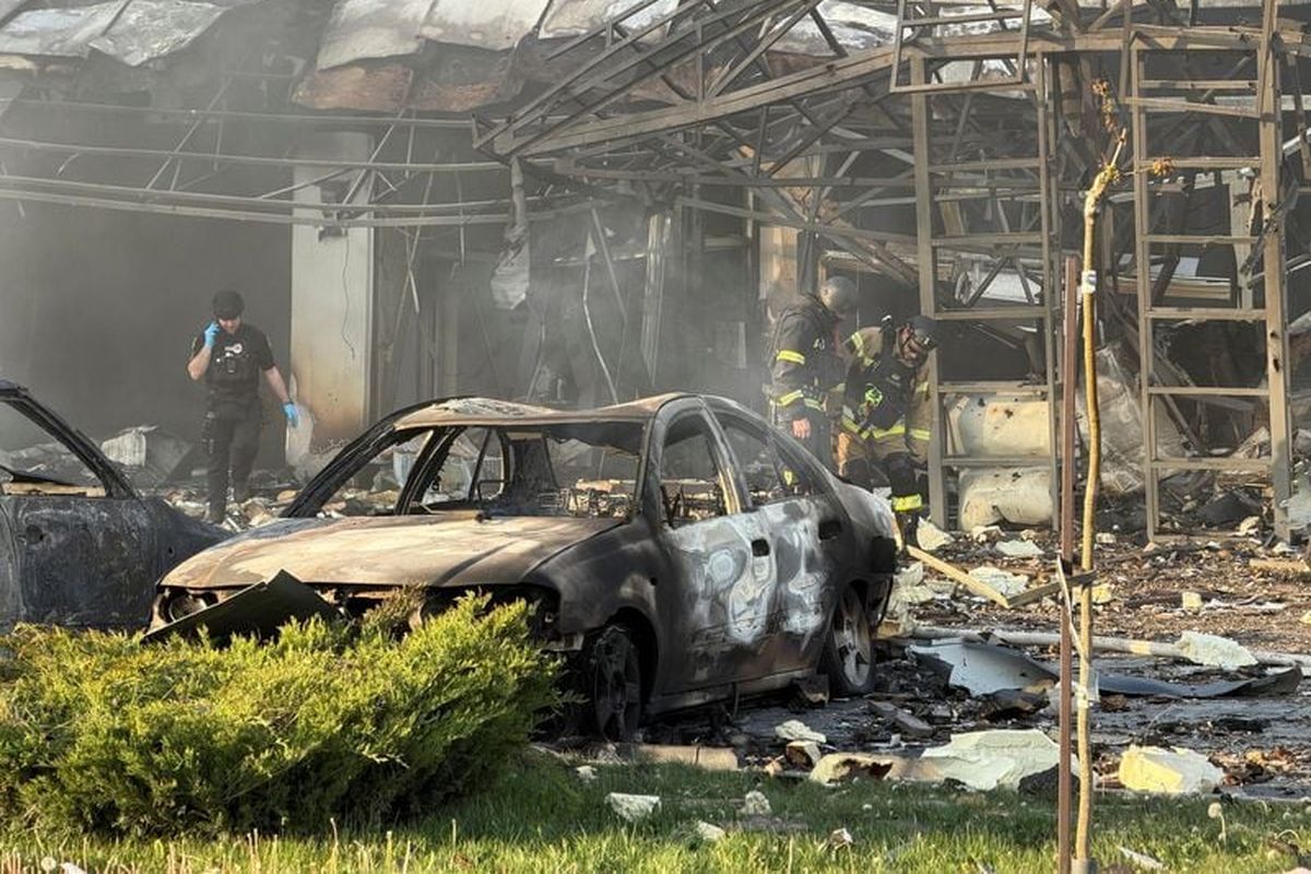 Rescuers work at a site of a Russian air strike, amid Russia
