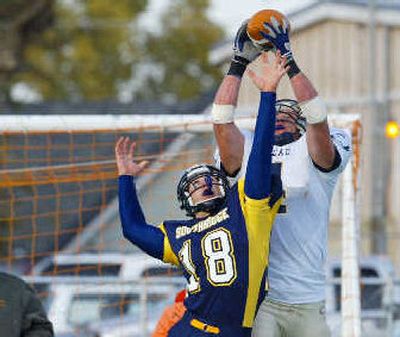 
Mead's Andy Mattingly snares a fourth-quarter TD pass over Jeff Scott. 
 (Paul T. Erickson/Special to / The Spokesman-Review)