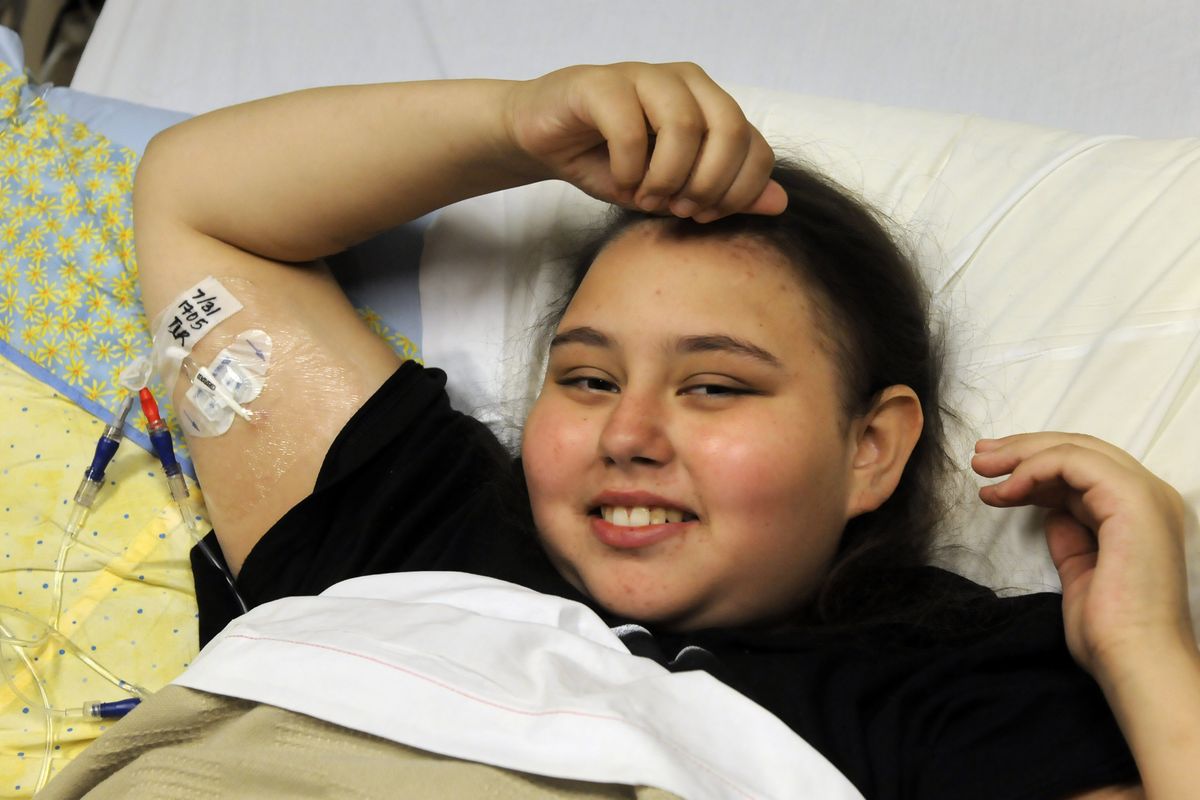 Alicia Ponce-Myers, 12, has spent the past month in a  Sacred Heart Children's Hospital room recovering from cancer. Alicia and her family, from Tonasket, Wash., are homeless and lived in a tent. (Dan Pelle / The Spokesman-Review)