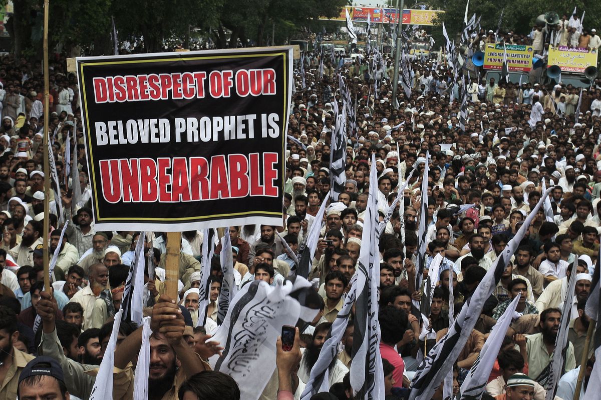 Thousands of supporters of a Pakistani religious group Jammat-Ud-Dawa Tehreek-e-Insaf or Movement for Justice take part in a demonstration in Lahore, Pakistan, Sunday, Sept. 16, 2012 as part of widespread anger across the Muslim world about a film ridiculing Islam