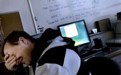 “It was clear from the start that it was widespread,” said  Richard Mathews, a technical support specialist at North Idaho College, of a computer virus that hit the school last week. Mathews continued to work Monday to eradicate the virus at the Coeur d’Alene campus. (Kathy Plonka / The Spokesman-Review)