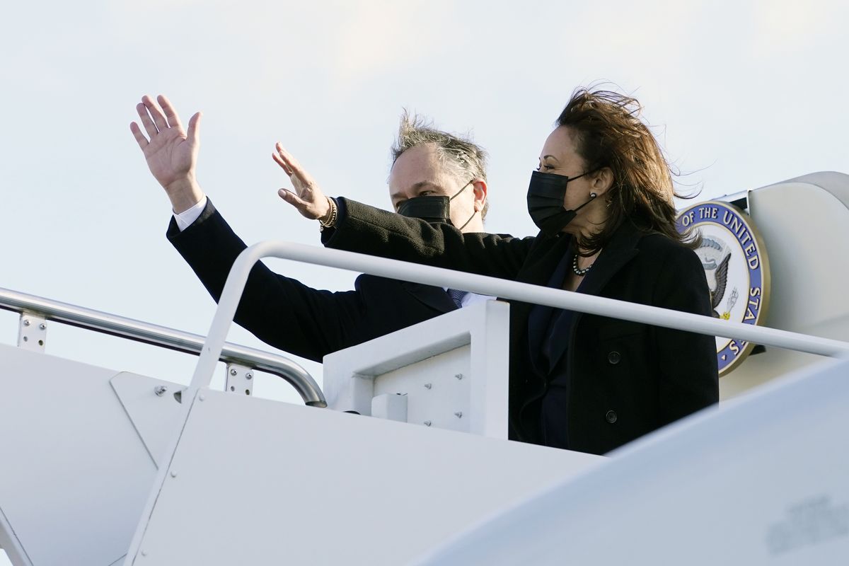 Vice President Kamala Harris and her husband, Doug Emhoff, wave as they board Air Force Two at Andrews Air Force Base, Md., Monday, March 15, 2021, en route to Las Vegas. President Joe Biden, Vice President Kamala Harris and their spouses are opening an ambitious, cross-country tour to highlight the $1.9 trillion coronavirus relief plan and its benefits.  (Jacquelyn Martin)