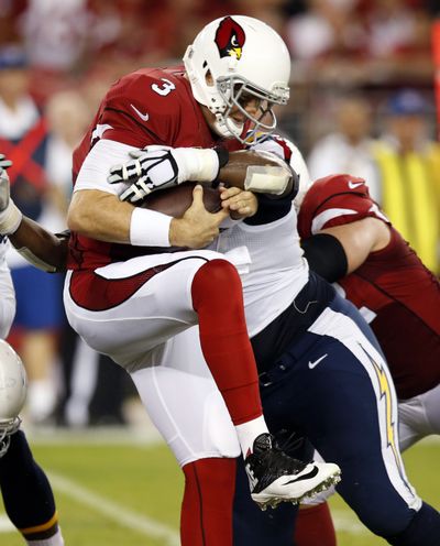 Carson Palmer has been sidelined with a pinched nerve in his shoulder that he suffered in Arizona’s season-opening victory. (Associated Press)