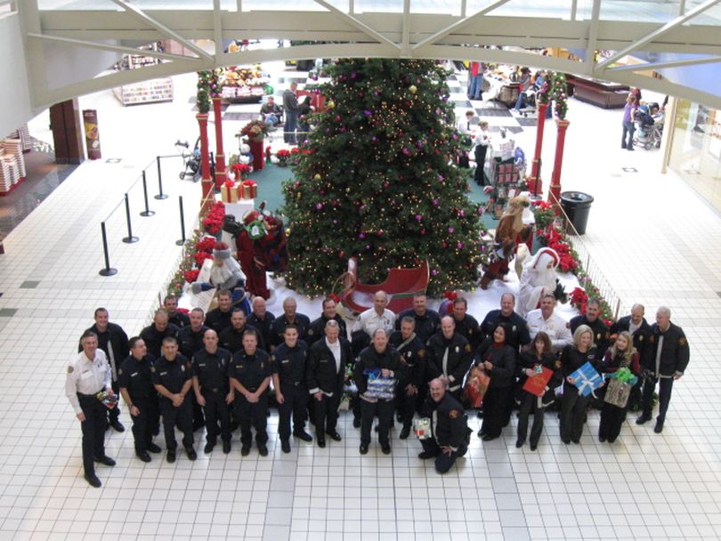 Firefighters and employees from Spokane Valley Fire shopped for the Tree of Sharing at the Valley Mall on Tuesday, Dec. 7. Photo is courtesy the Spokane Valley Fire Department. (Photo courtesy Spokane Valley Fire Department)