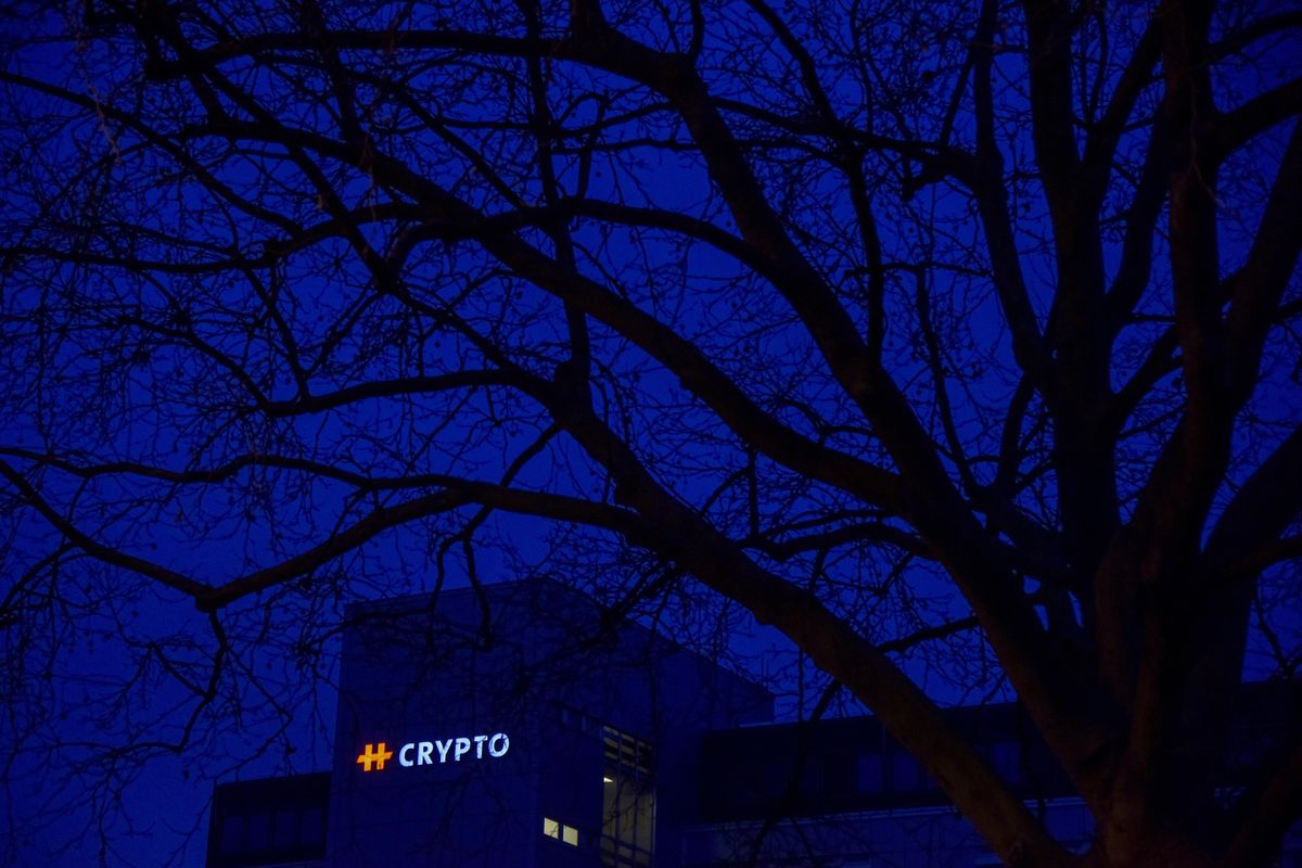 Crypto’s sign is still visible atop its longtime headquarters near Zug, Switzerland, though the company was liquidated in 2018. (Jahi Chikwendiu / Washington Post)