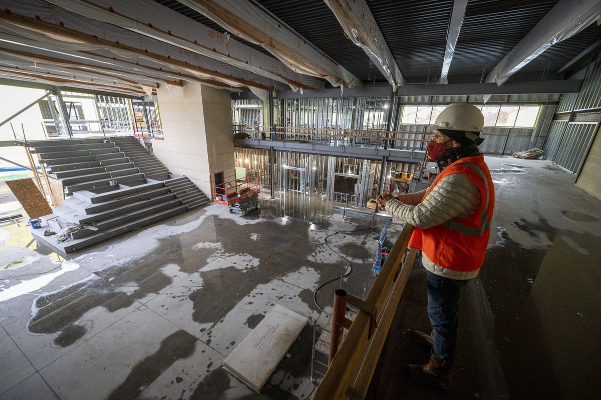 During a tour of the new Shaw Middle School, Greg Forsyth, project chief with Spokane Public Schools, looks out over the new cafeteria/multipurpose room under construction Friday in northeast Spokane. The 150,000-square-foot school includes 41 classrooms, a commons and kitchen, library (combined with Hillyard Library in partnership with the Spokane Public Library), gymnasium and fitness center, administration offices and a community outreach center. It should be complete in about 10 months.  (Colin Mulvany/THE SPOKESMAN-REVIEW)