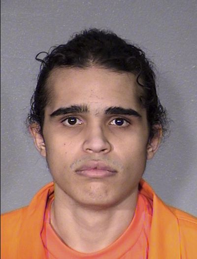 This undated photo provided by the Arizona Department of Corrections shows Kitage Lynch. Lynch, a man recently imprisoned for shooting at police officers in metro Phoenix now faces murder charges in a rural western Arizona county where he is accused of killing three Washington state residents at a desert property in 2016. La Paz County authorities soon after the 2016 triple-homicide identified Kitage Lynch as a suspect in the case and court records obtained Friday, July 6, 2018, indicate a 2017 grand jury indictment him charged in the killings while awaiting trial in the Phoenix-area case. (AP)