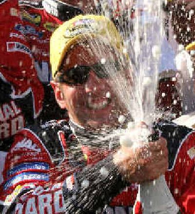 
Greg Biffle's enthusiasm bubbled over after winning NASCAR's MBNA 400 on Sunday.
 (Associated Press / The Spokesman-Review)