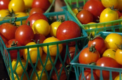 
Red, yellow, green, white, cherry, heirloom and other kinds of tomatoes are available at the Spokane Farmers' Market. 
 (Holly Pickett / The Spokesman-Review)