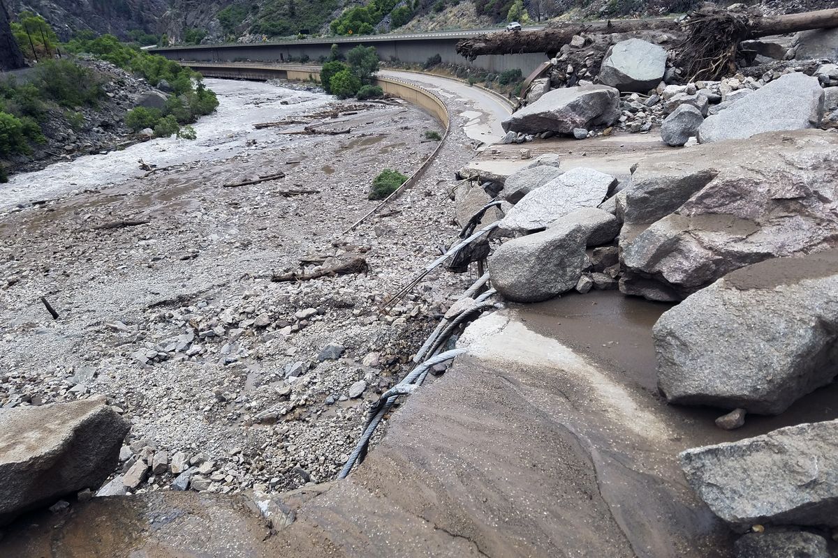 This image provided by the Colorado Department of Transportation shows mud and debris on U.S. Highway 6, Sunday, Aug. 1, 2021 west of Silver Plume, Colo. Mudslides closed some Colorado highways as forecasters warned of potential flash flooding on Sunday across the Rocky Mountain and Great Basin regions.  (HOGP)