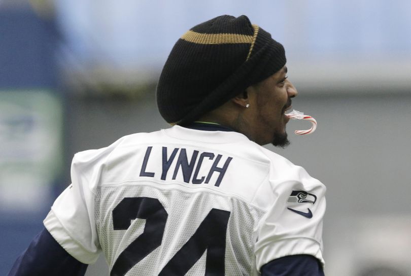 Seattle Seahawks running back Marshawn Lynch was officially listed as retired on Thursday. (Ted S. Warren / Associated Press)