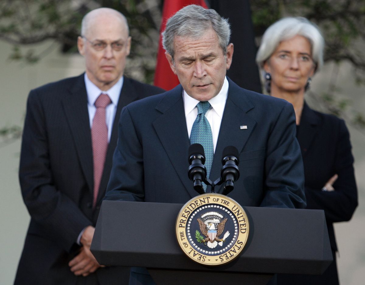 President Bush (with Treasury Secretary Henry Paulson, left, and French Finance Minister Christine Lagarde): “All of us recognize that this is a serious global crisis.” (Associated Press / The Spokesman-Review)