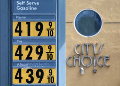 
The price board at a Shell gas station is shown in San Francisco on Monday. At the pump, the national average price of a gallon of gas edged lower overnight to $3.373 a gallon, 0.1 cent shy of a new record set Sunday, according to a survey of stations by AAA and the Oil Price Information Service. Associated Press
 (Associated Press / The Spokesman-Review)