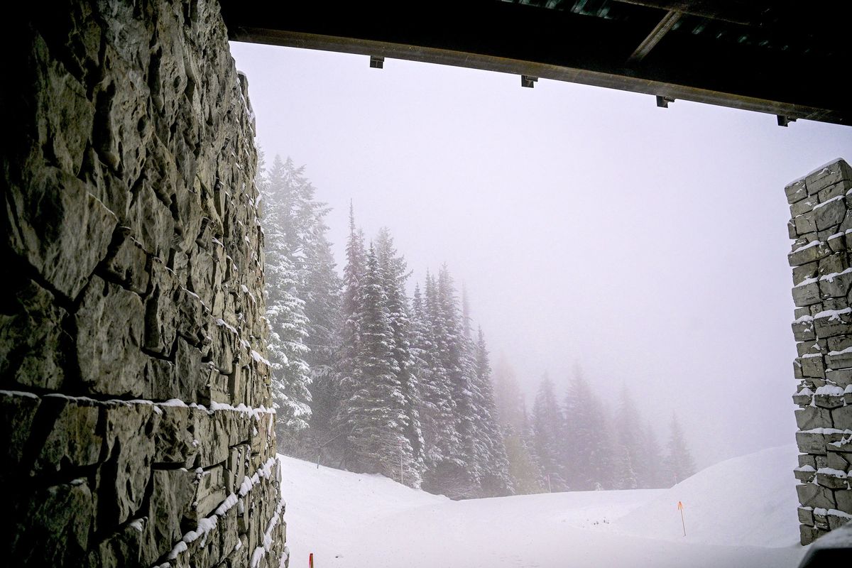 Afternoon snow falls over a ski bridge at Crystal View subdivision on Nov. 1 at Schweitzer Mountain Properties.  (Kathy Plonka/The Spokesman-Review)