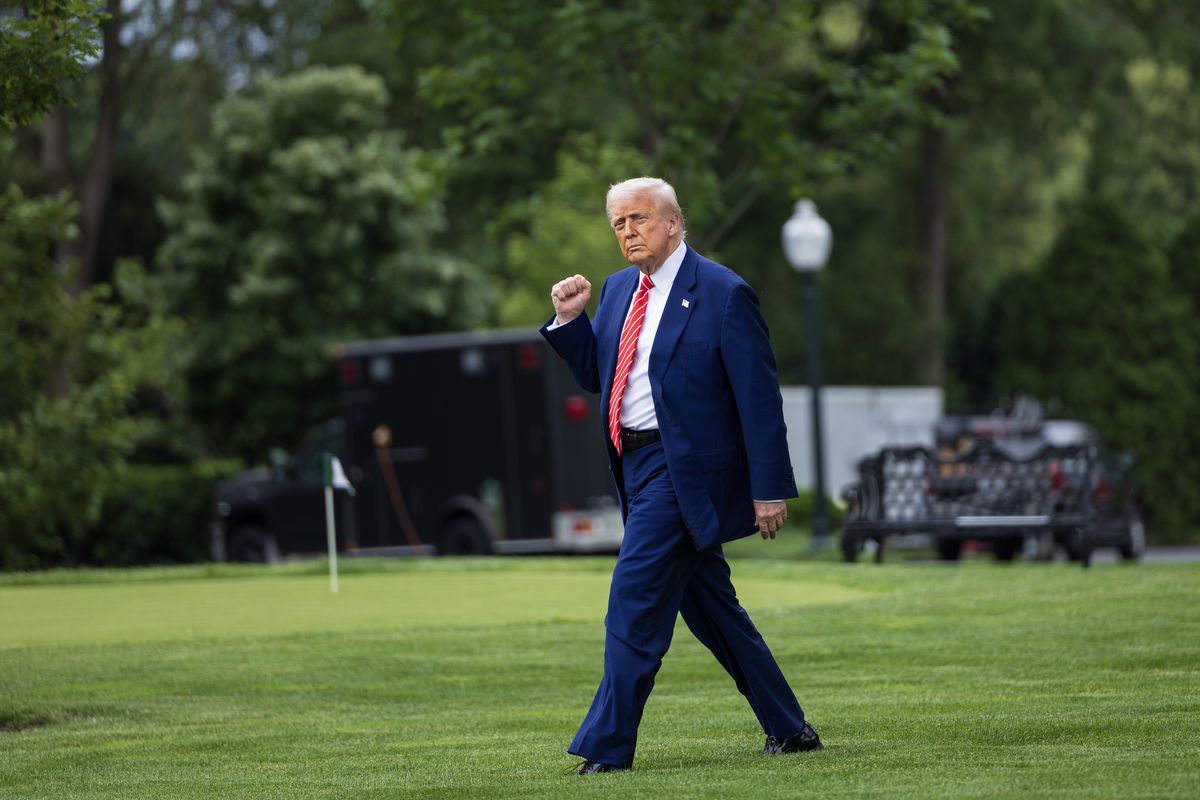 President Donald Trump walks from the White House to Marine One on May 30.  (Tom Brenner/For The Washington Post)