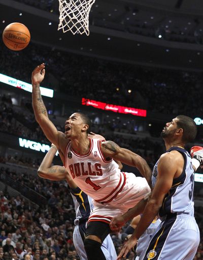 Chicago’s Derrick Rose scored 24 to lead Bulls past Grizzlies. (Associated Press)