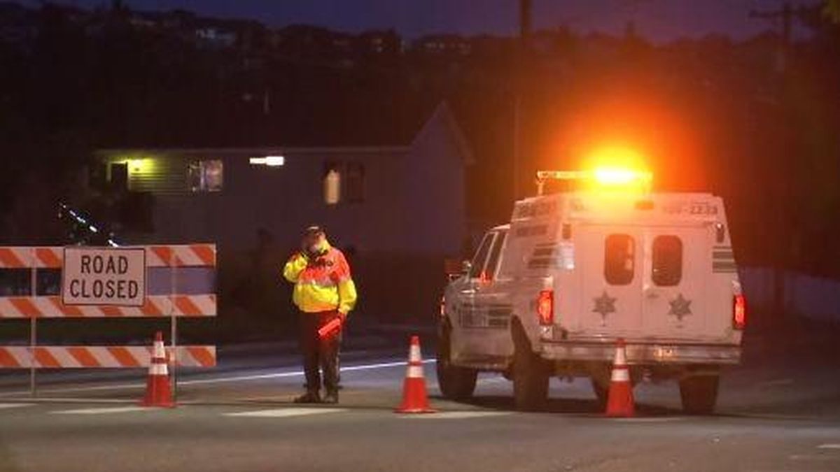 An early morning vehicle crash in Spokane Valley damaged a power pole, knocking out power for more than 1,000 homes and closing almost a mile of North Argonne Road on Tuesday, Sept. 24, 2019. (KHQ)