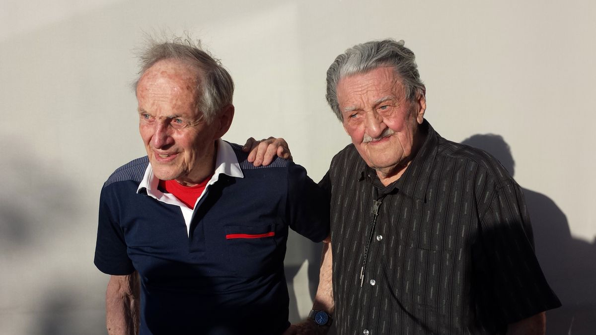 Bill Fix, left, and Joe Collins -- legendary Spokane Mountaineers -- celebrate Joe