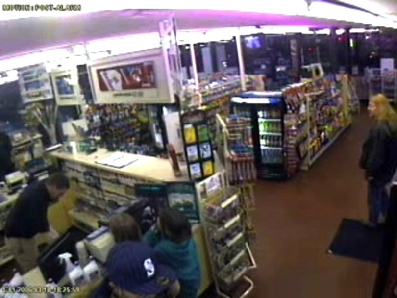This screenshot of Zip Trip surveillance video shows Otto Zehm inside the store on March 18, 2006. One of the young girls pictured, Britni Brashers, testified at the trial of Officer Karl Thompson. (Zip Trip surveillence video)