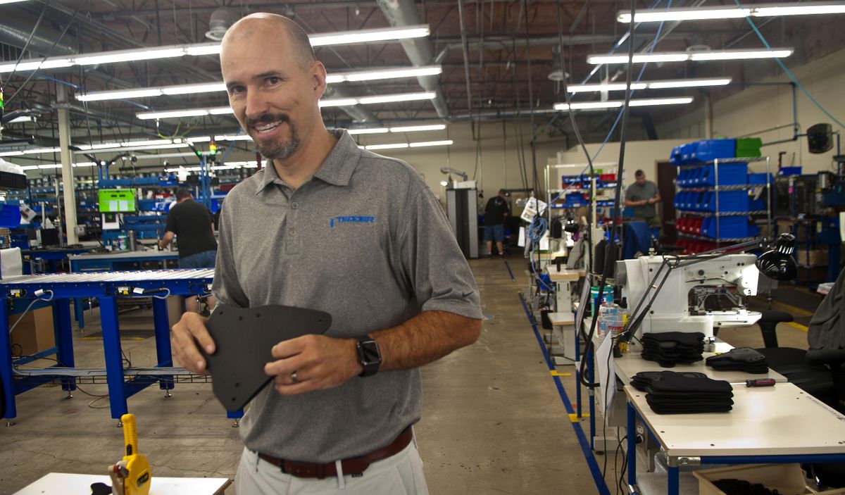 Thomas Tedder of Tedder Industries talks about the process of making holsters during a tour of the facility in Post Falls on Thursday, August 15, 2019. (Kathy Plonka / The Spokesman-Review)