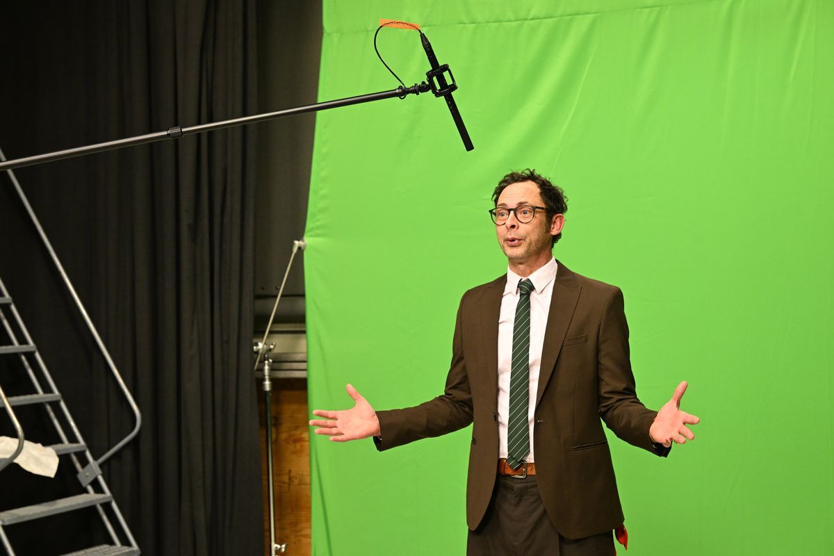 Ryan Tucker, right, host of “Saturday Night Cinema,” performs his movie introduction for the program at the KSPS studios on Jan. 15 in Spokane. Cuts to government funding of public television is changing how broadcasters are operating.  (Jesse Tinsley/THE SPOKESMAN-REVIEW)
