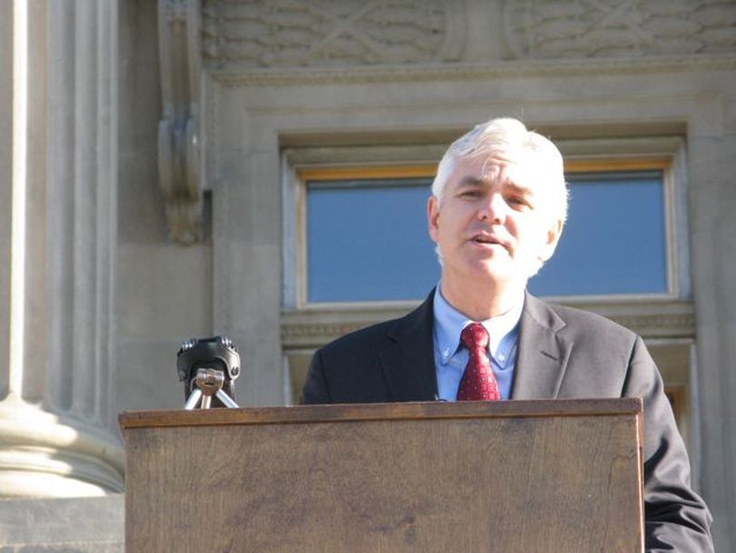 Keith Allred, Democratic candidate for governor of Idaho, calls for reversing Gov. Butch Otter's decision to pull the state out of wolf management, during a news conference on the Idaho capitol steps on Thursday. (Betsy Russell)