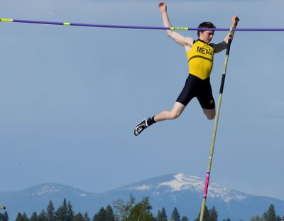 Mead's Blase' Neuman clears the bar while competing in the pole vault during the GSL 4A/3A district track meet on Thursday, May 10, 2012, at Spokane Falls Community College in Spokane. (Tyler Tjomsland)