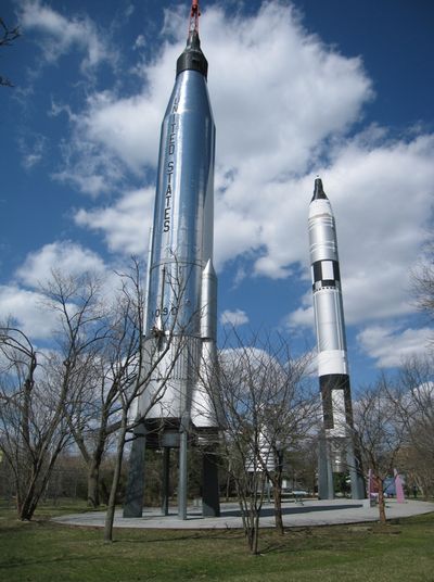 At left: Two NASA rockets that debuted at the 1964 World’s Fair still sit on display outside the New York Hall of Science in Corona in the Queens borough of New York. Below: A restored statue is one of the remaining symbols from the fair.