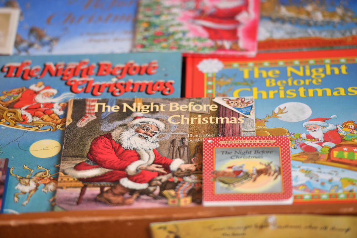 Eileen Webber shows her collection of “Night Before Christmas” books on Wednesday, Dec. 13, 2023, at her home in Spokane, Wash.  (Tyler Tjomsland/The Spokesman-Review)