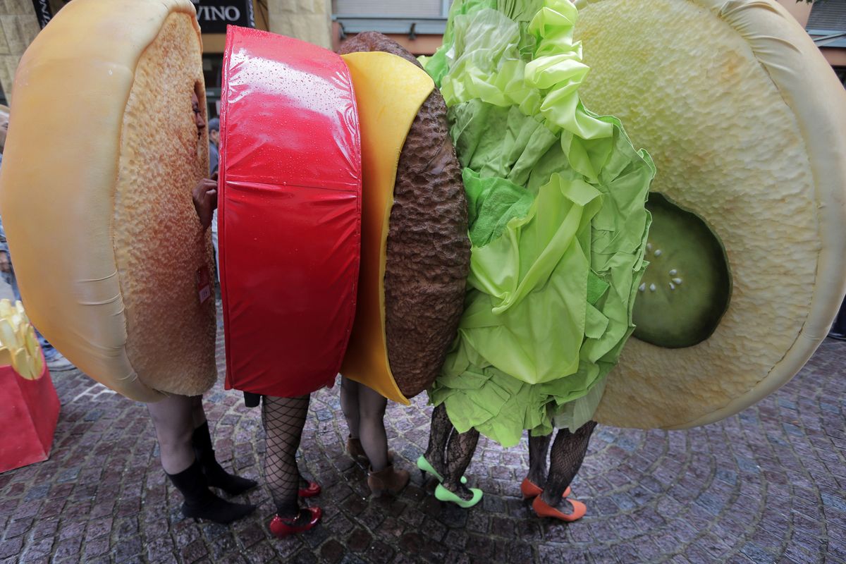 A group of costumed participants march during a Halloween event in Kawasaki, near Tokyo, Sunday, Oct. 28, 2012. (Itsuo Inouye / Associated Press)