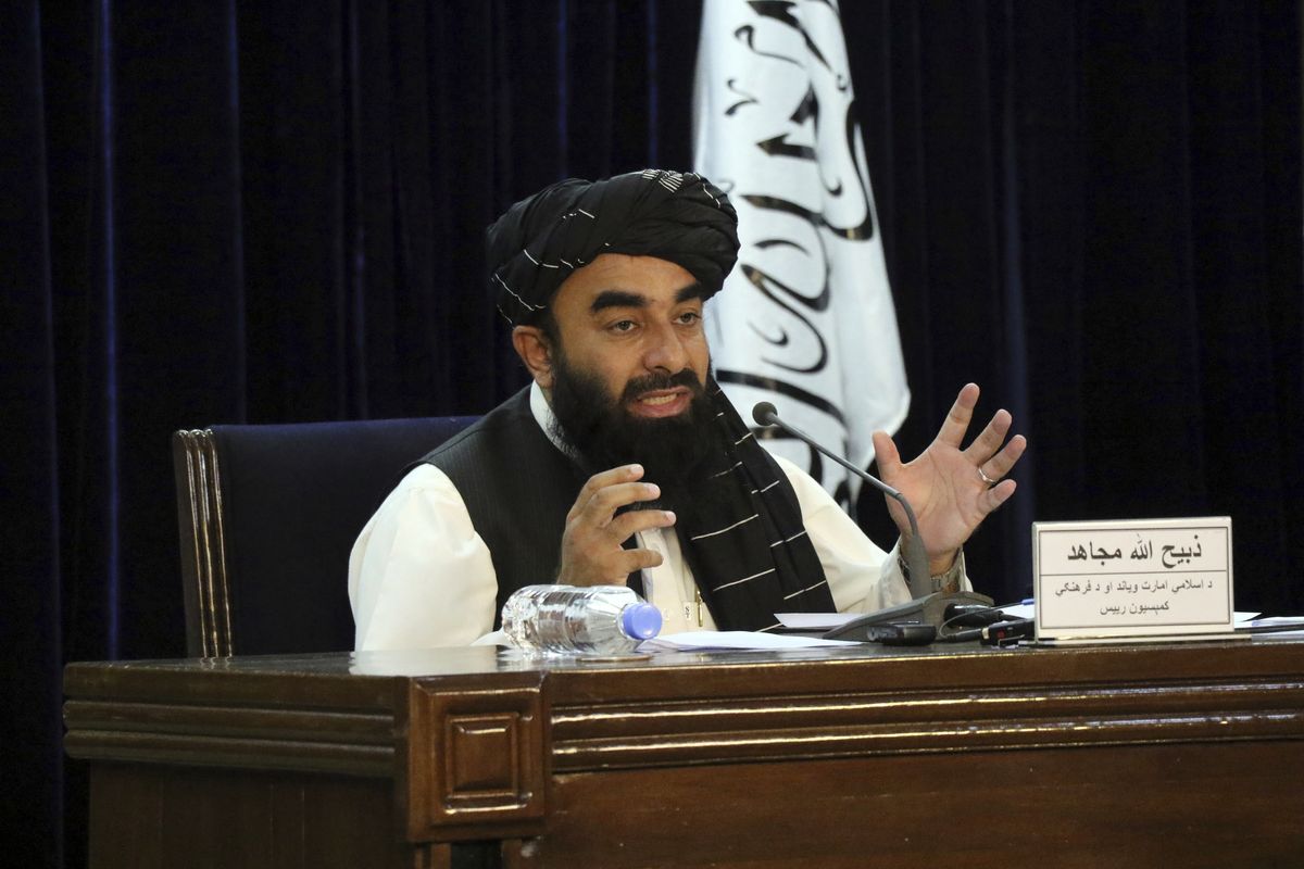 Taliban spokesman Zabihullah Mujahid speaks during a news conference in Kabul, Afghanistan, on Tuesday.  (Muhammad Farooq)
