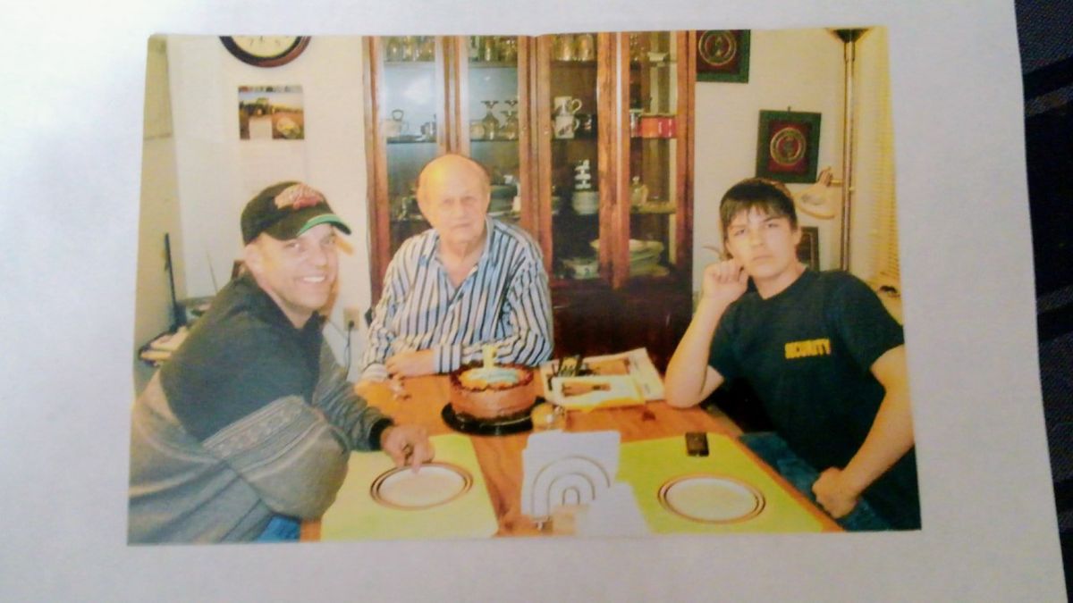 A family photo circa 2010-11, shows Bert Porter, center, his son, John Soberg, left, and grandson Jeffrey Soberg. Porter died Nov. 4 at age 92.  (Porter family photo)