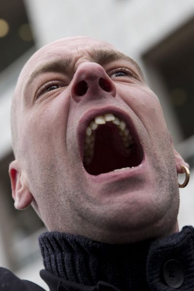 A man shouts anti-immigration slogans during a Pegida demonstration in Amsterdam, Netherlands, Saturday. (Peter Dejong / Associated Press)