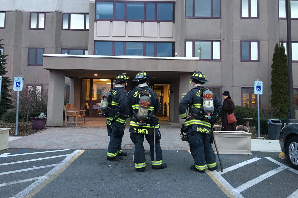 A fire forced the evacuation of a Lilac Plaza Retirement Community, 7007 N. Wiscomb St., in north Spokane early Monday. (Dan Pelle / The Spokesman-Review)