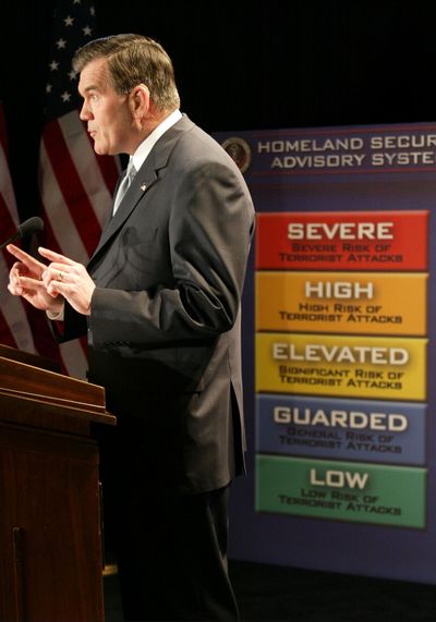 Homeland Security Director Tom Ridge unveils a color coded system that ranks the severity of terrorist threats March 12, 2002, in Washington DC. The system is designed to prepare local police and the public for attacks. (Mark Wilson/Getty Images/TNS)  (Mark Wilson/Getty Images North America/TNS)