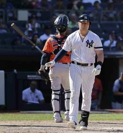 New York Yankees’ Luke Voit throws his bat after striking out during the eighth inning of a baseball game against the Houston Astros at Yankee Stadium, Sunday, June 23, 2019, in New York. (Seth Wenig / Associated Press)