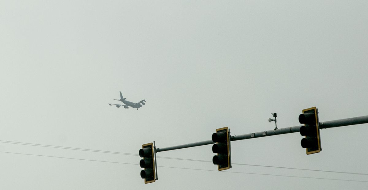 An airplane flies through smoky air Friday in Airway Heights on Friday, Sept 8, 2017. (Kathy Plonka / The Spokesman-Review)