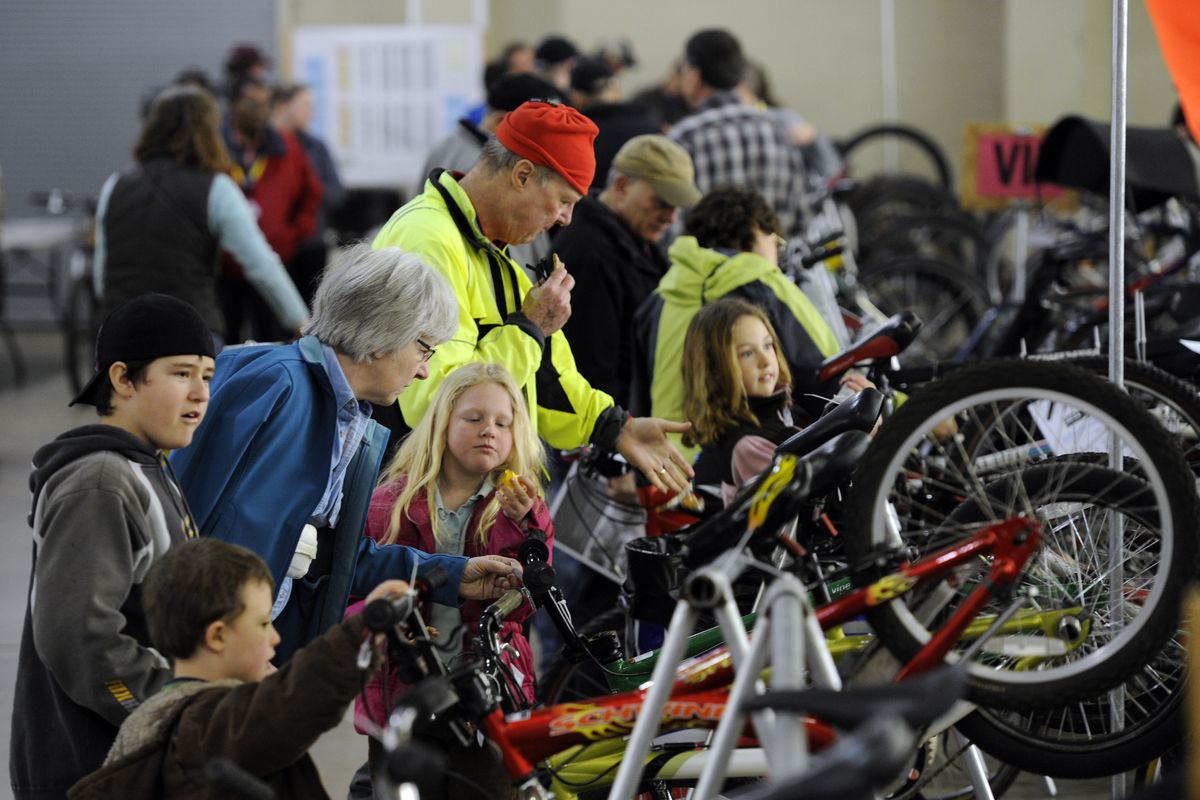 Expect families, fitness enthusiasts, cycle buffs and first-timers to mob the racks of used bikes at the Spokane Bike Swap at the Spokane Fair and Expo Center in April. (File)