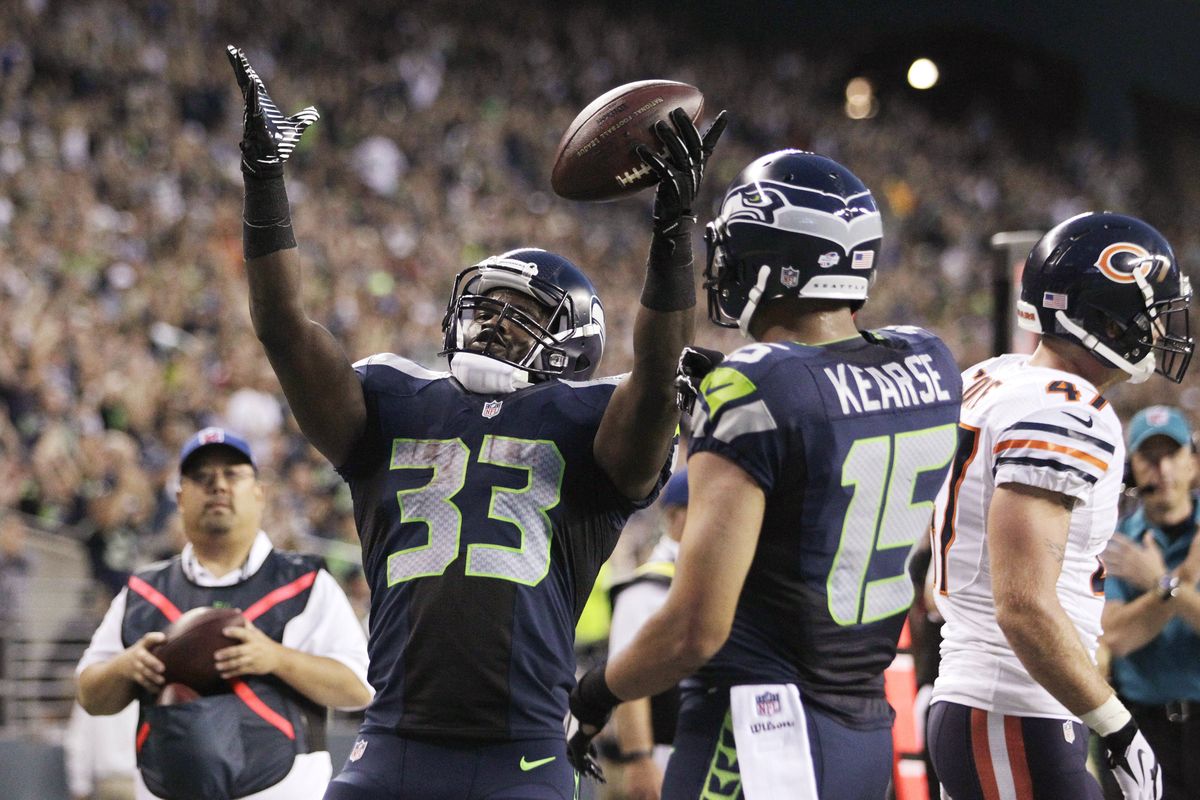 Running back Christine Michael gave the Seahawks a 28-0 lead in the second quarter after scoring on a 7-yard touchdown pass. (Associated Press)