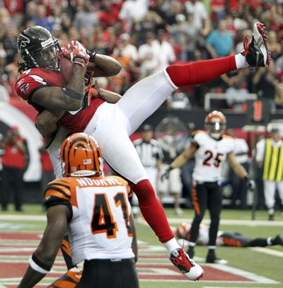 Atlanta WR Roddy White had 201 yards and two TDs. (Associated Press)