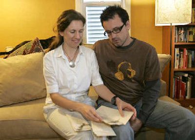 
Jen Crane, left, and Tom Frohlich, send out some invitations for their July wedding in Seattle. 
 (Associated Press / The Spokesman-Review)