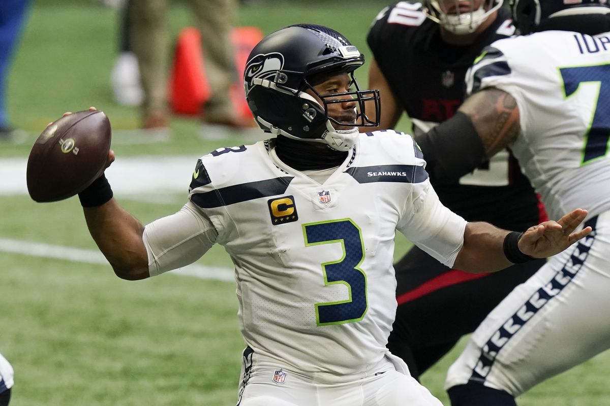 Seattle Seahawks quarterback Russell Wilson (3) works in the p[ocket against the Atlanta Falcons during the first half of an NFL football game, Sunday, Sept. 13, 2020, in Atlanta.  (Brynn Anderson)