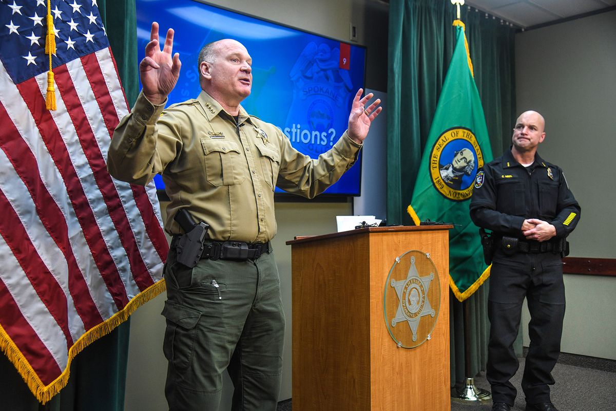 Spokane County Sheriff Ozzie Knezovich, left, and Spokane Police Chief Craig Meidl hold a news conference at the Spokane Public Safety Building on Monday to address putting an end to gang violence in the Spokane area  (DAN PELLE/THE SPOKESMAN-REVIEW)