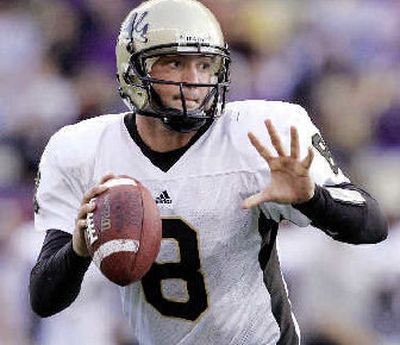 Quarterback Steven Wichman's performance fluctuated from stellar to suspect.
(Associated Press / The Spokesman-Review)
