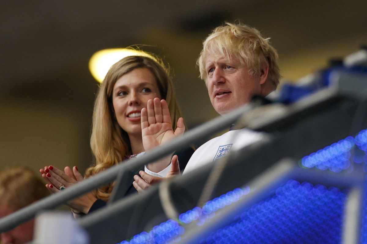 British Prime Minister Boris Johnson and his wife Carrie watch the Euro 2020 soccer championship final between England and Italy at Wembley stadium in London, Sunday, July 11, 2021.  (John Sibley)