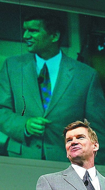 Below a live video feed of himself, the Rev. Ted Haggard delivers a sermon to those gathered at the New Life Church in Colorado Springs in 2002.
(Associated Press / The Spokesman-Review)