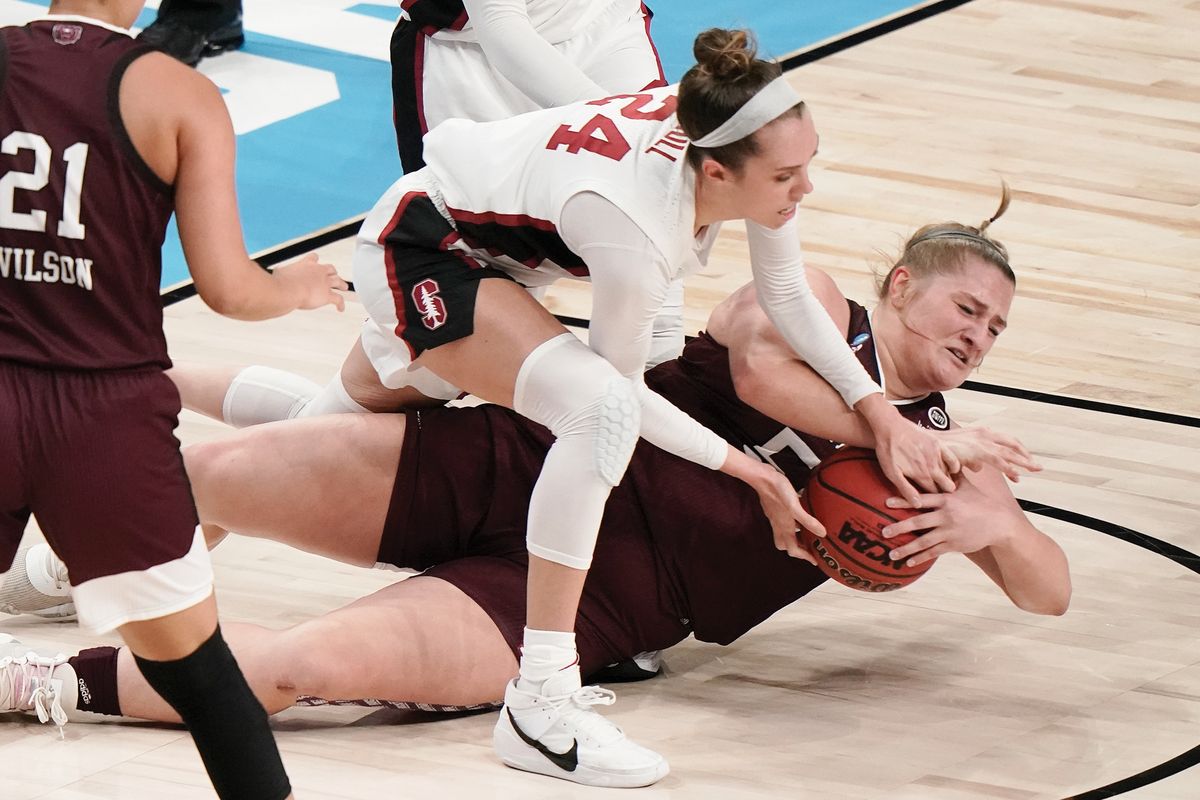 Missouri State’s Emily Gartner, bottom, and Stanford’s Lacie Hull battle for a loose ball in a women’s NCAA Tournament Sweet 16 showdown last Sunday in San Antonio.  (SSR)