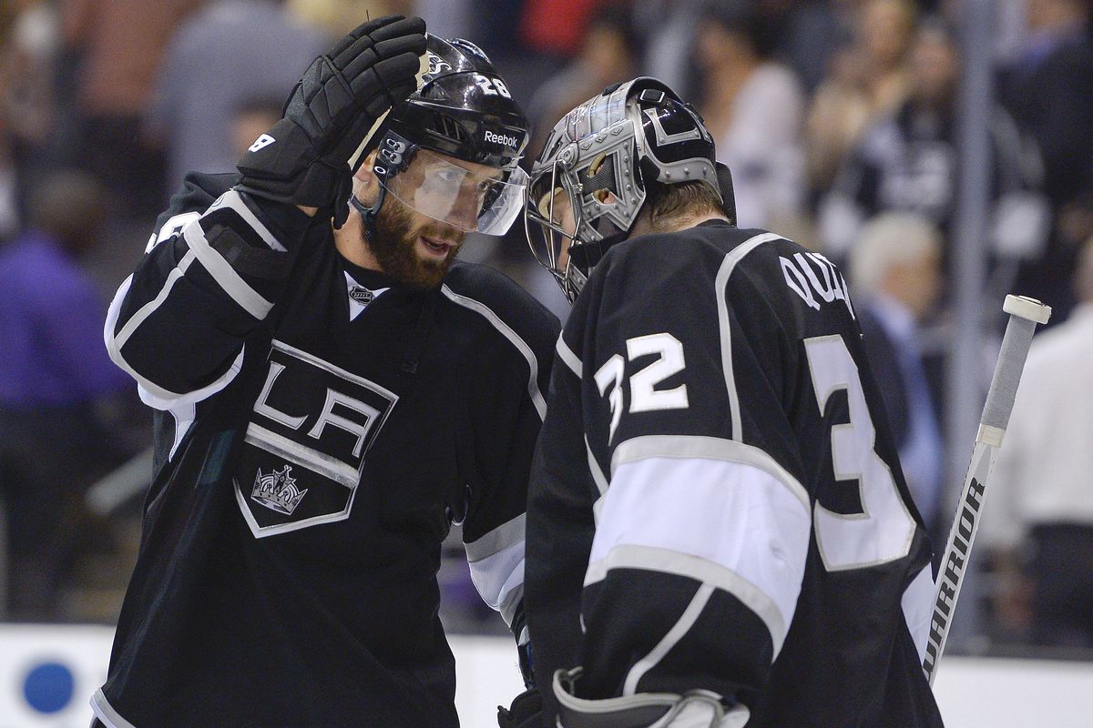 Kings center Jarret Stoll, left, and netminder Jonathan Quick celebrate after Los Angeles won Game 3 of the Western Conference finals. (Associated Press)